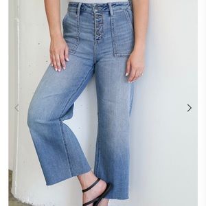 Carly Jean Los Angeles. Wide leg, slightly distressed, “Hendricks”  Size 7.